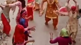 Indian Neighborhood Women Stick Fight in the Street
