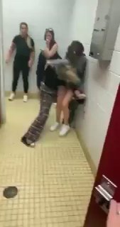 Blonde in Pajamas Fights Brunette in School Bathroom
