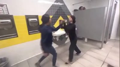 Girl Fight in Yellow Bathroom