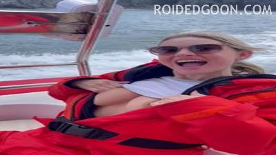 Blonde Flashes Boobs While Riding on a Speedboat